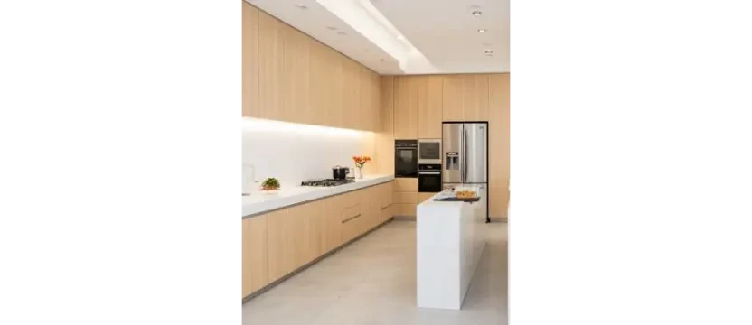 SKKS expert empty kitchen deep cleaning service showing a spotless modern kitchen with light wood cabinets and clean white countertops