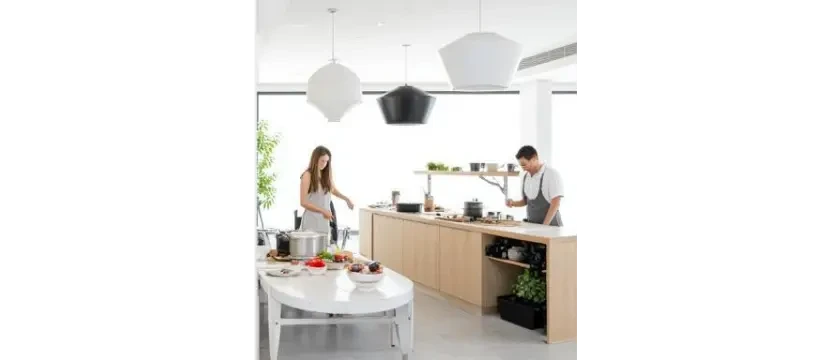 SKKS professional occupied kitchen cleaning service showing a clean and bright modern kitchen with people actively cooking and preparing food